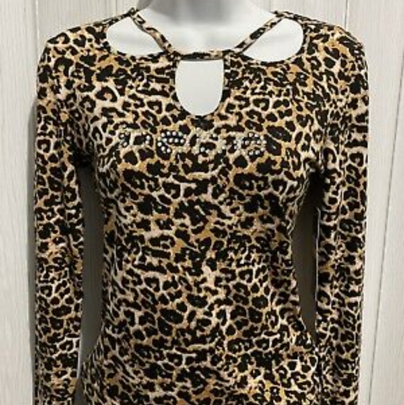 bebe Tops - BEBE Cheetah Print Long sleeve